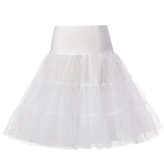 Jupon en tulle blanc posé sur une chaise, comparaison avec une jupe en tulle classique